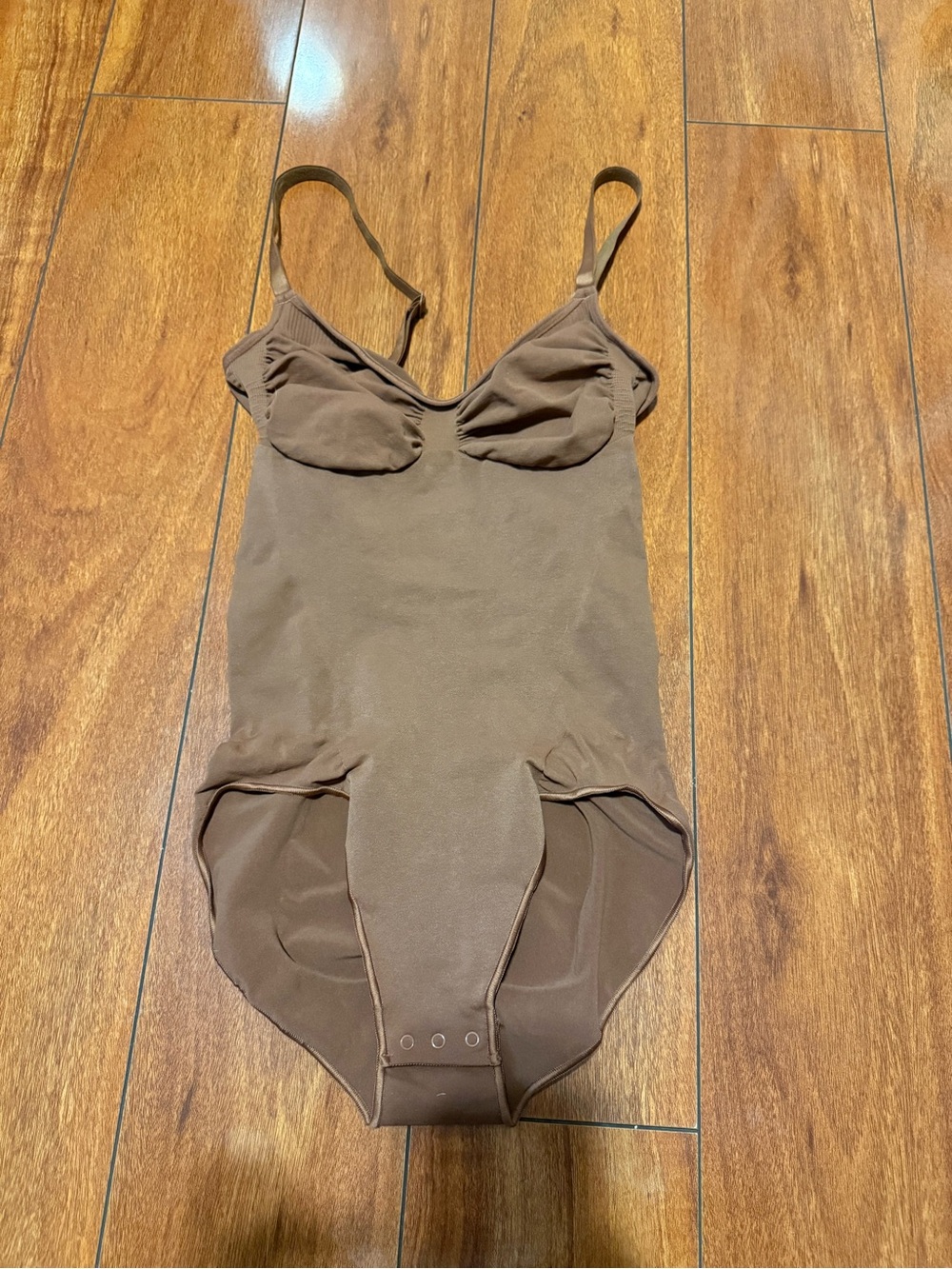 Skims women’s Brown One-Piece Bodysuit